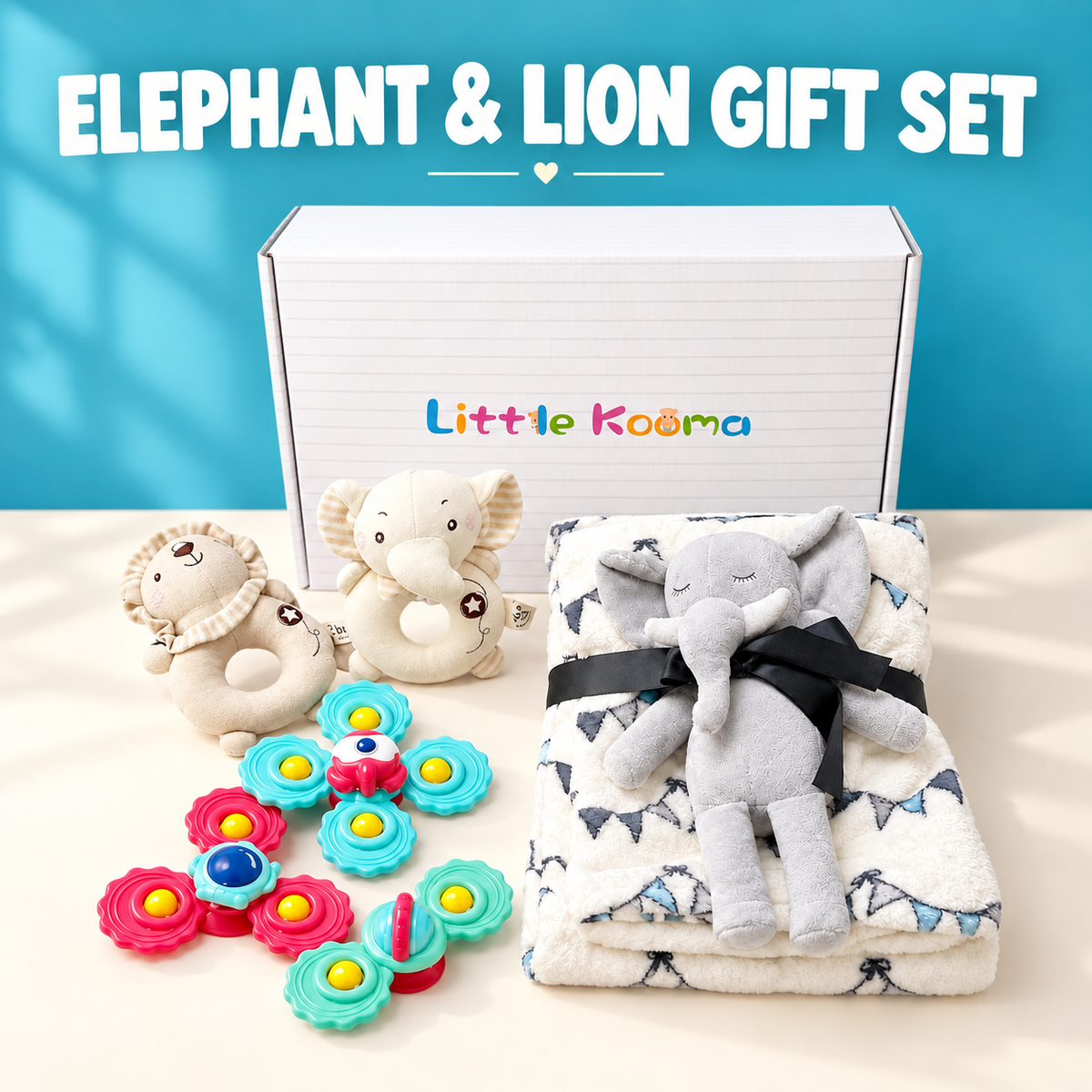 Little Kooma Elephant and Lion newborn gift box with plush blanket, elephant plush, two stuffed rattles and three spinning toys