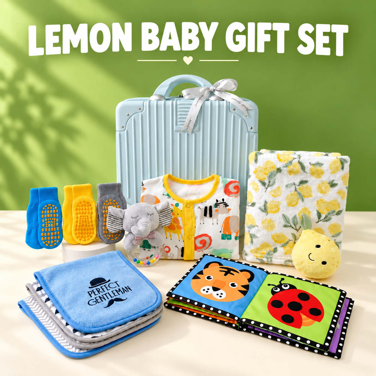 Lemon baby gift set with blue suitcase, animal-print sleepsuit, lemon blanket, socks, burp cloths, elephant rattle and cloth book
