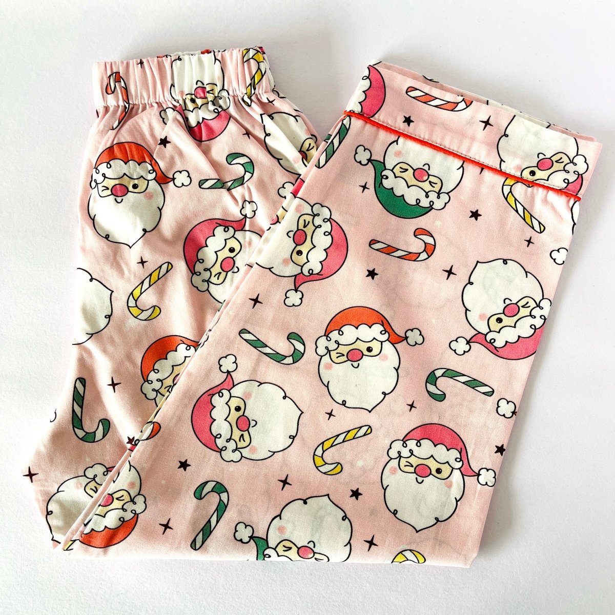 Pink Winking Santa Pyjamas - Little Kooma